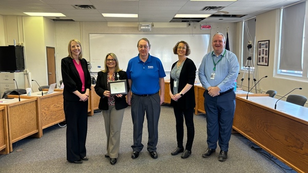 Staff pictured with award